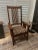 Stickley Mission Oak Spindle High Back Arm Chair. Solid quarter sawn oak, with William Morris style upholstery. Pieces...
