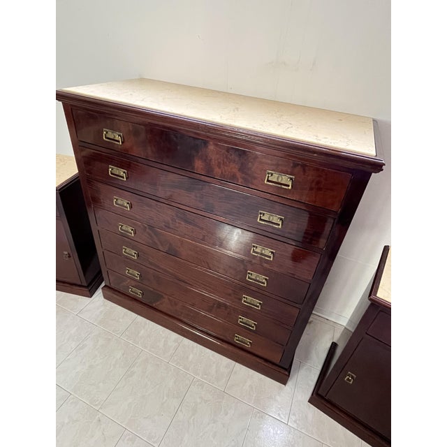 Set of 3 chests of drawers and bedside tables with marble tops, 1960s The chest of drawers has 7 drawers, the bedside...