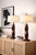 Mobile-Ready Blurb A striking pair of sculptural table lamps defined by bold faceted geometry and a rich wood-tone finish....