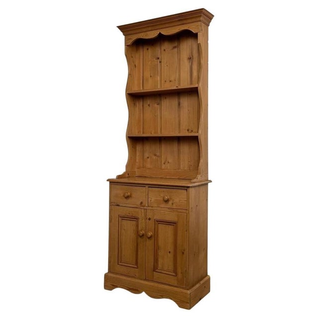 A charming and particularly versatile vintage 20th-century Welsh dresser, well constructed in pine and distinguished by...