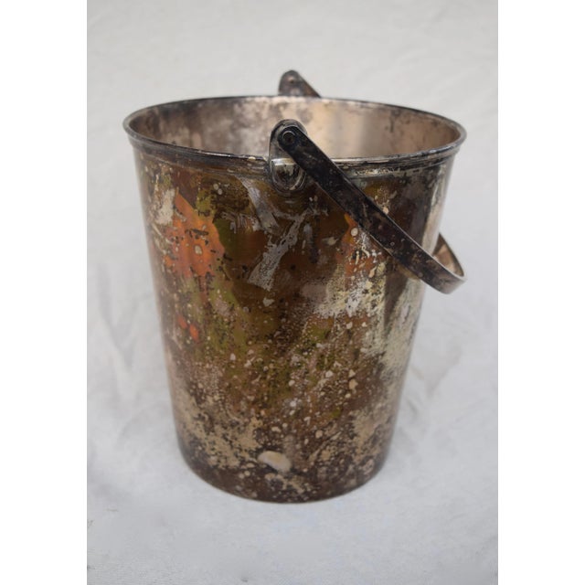 Midcentury ice bucket of silver-plated copper with striking original, naturally patinated finish resembling that of an...