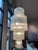 An Italian vintage Murano glass “tronchi” chandelier is a decorative lighting fixture made on the Venetian island of...