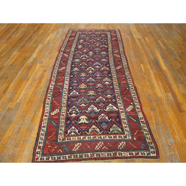 Antique Caucasian - Kazak rug. Measures: 3'6"x 9'10". Antique Caucasian Caucasian Blue 1890s Rug, Circa Date: 1890s. This...