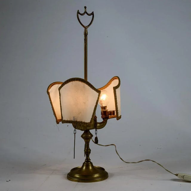 Table lamp, Florentine ancient light, electrified brass light in the following era, the light dates back to the end of...