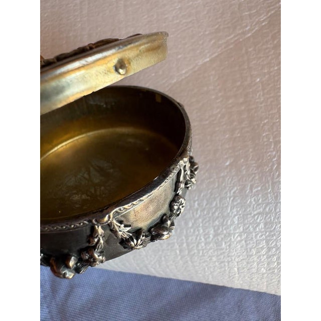A wonderfully ornate antique French hinged vanity or trinket box, found at a French market and dating approximately to the...