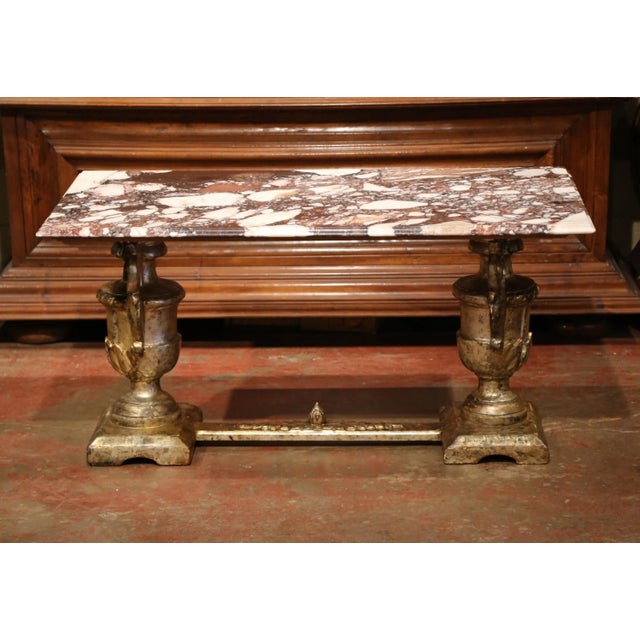 Add extra surface space to your formal living room with this elegant antique coffee table, crafted in Italy circa 1850,...