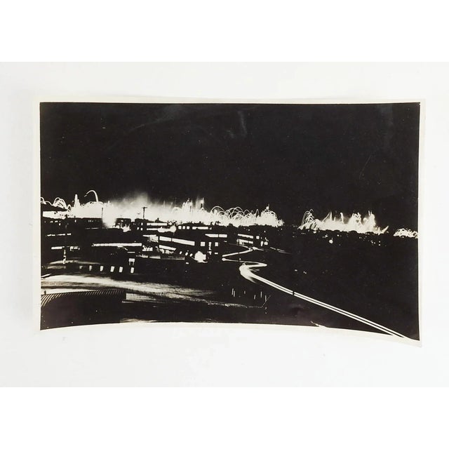 Vintage black and white time lapse photograph. Night shot of city fireworks, unsigned. Unframed, shallow edge crease.