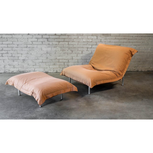 Ligne Roset 'Calin' lounge chair and matching ottoman designed by Pascal Mourgue, circa 1990s. Inspired by the cozy shape...
