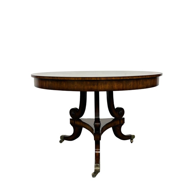 Elegant vintage round center table by Maitland-Smith, handcrafted in the Philippines and retaining its original...