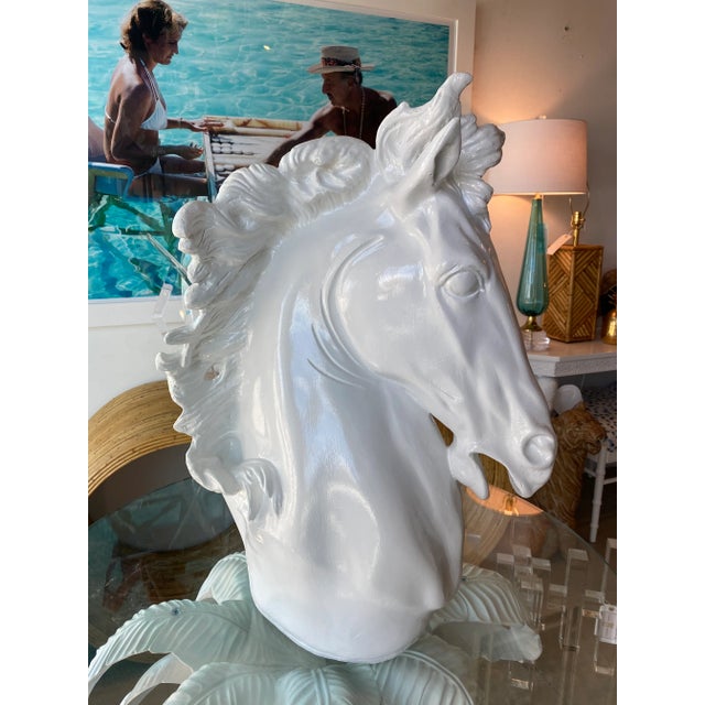 Vintage large plaster horse statue lacquered in a white gloss for a modern twist. No chips or breaks. I do have two of...
