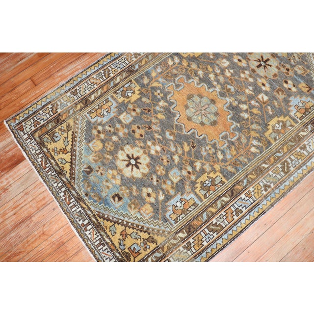 An early 20th Century Antique Persian Malayer Rug