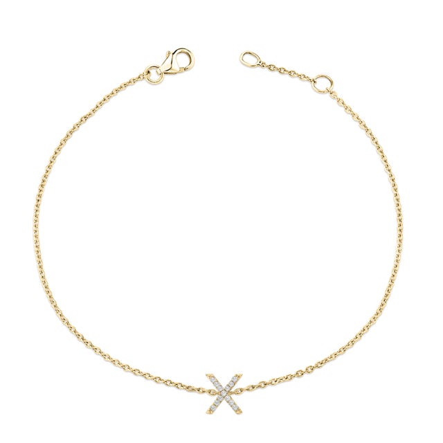Immerse yourself in the understated elegance of this 10K yellow gold bracelet, for an enrapturing shimmer that captures...