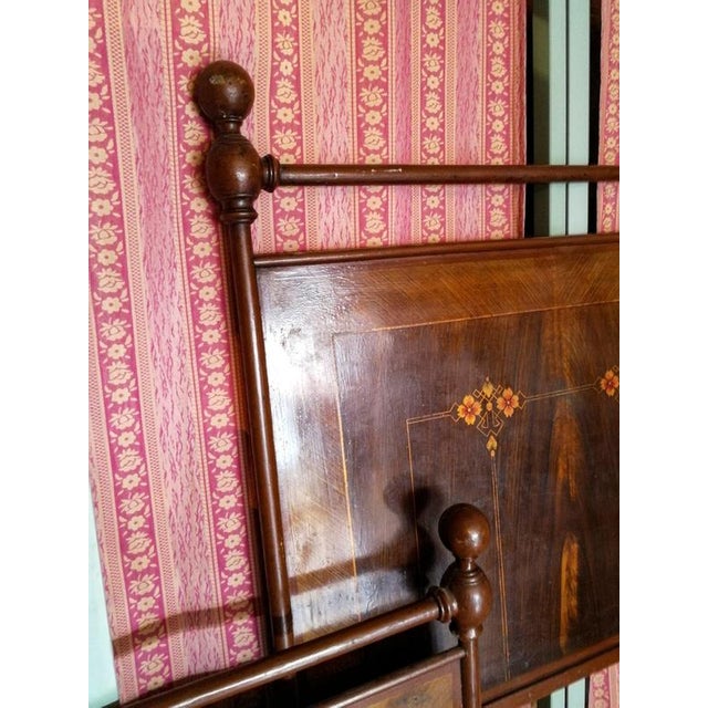 This vintage single bed, dating back to the early 20th century, is a charming period piece in perfect Art Nouveau style....