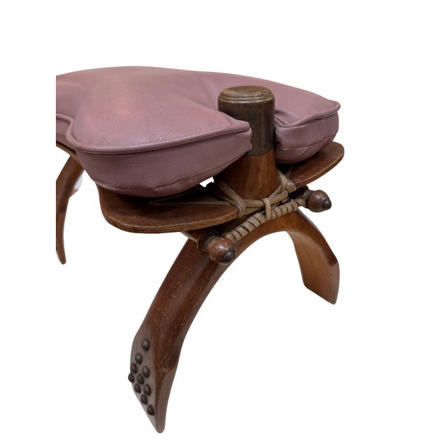 Midcentury middle eastern camel saddle stool.
