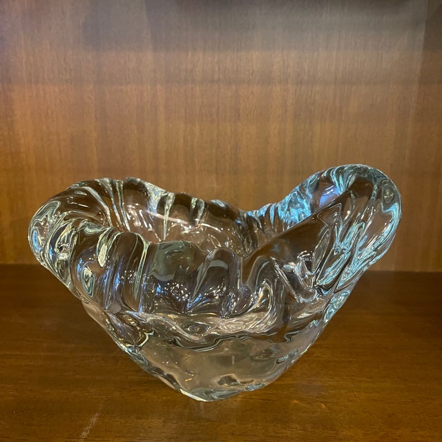 Fluid, cloud like curves characterize this mid-century art glass dish. This biomorphic, freeform dish is made from heavy...