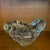 Fluid, cloud like curves characterize this mid-century art glass dish. This biomorphic, freeform dish is made from heavy...