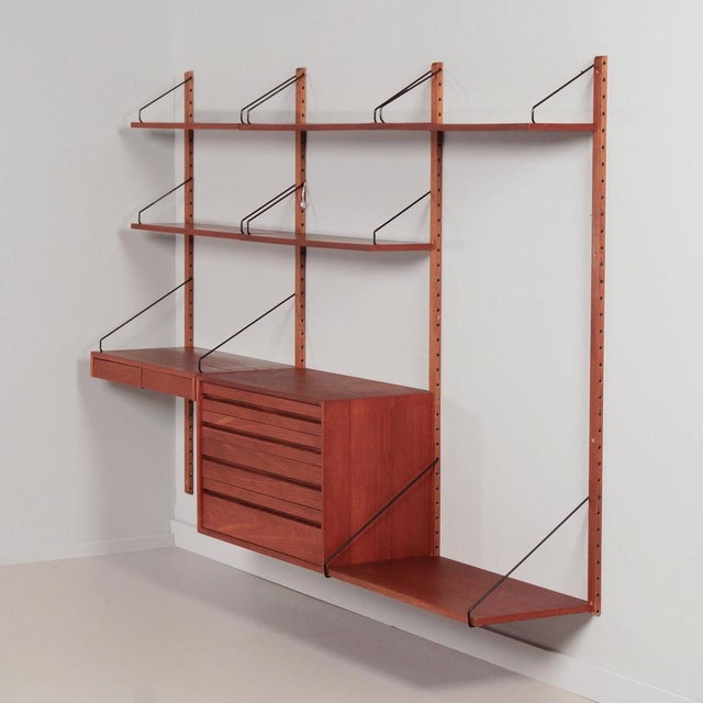 Royal system cadovius wall system from the 1960s, designed by poul cadovius for cado denmark. This modular wall system in...