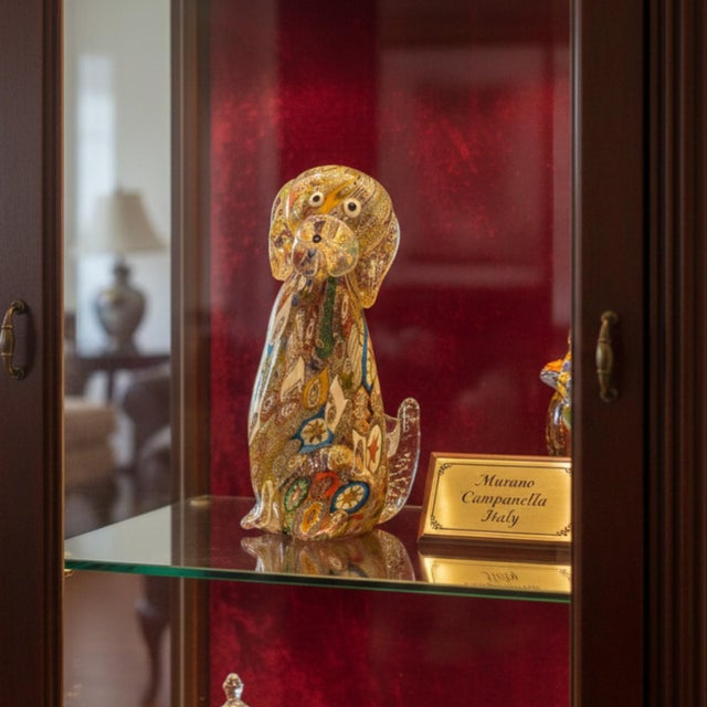 This Murano glass dog figurine is attributed to the Campanella workshop and exemplifies mid- to late-20th-century Venetian...