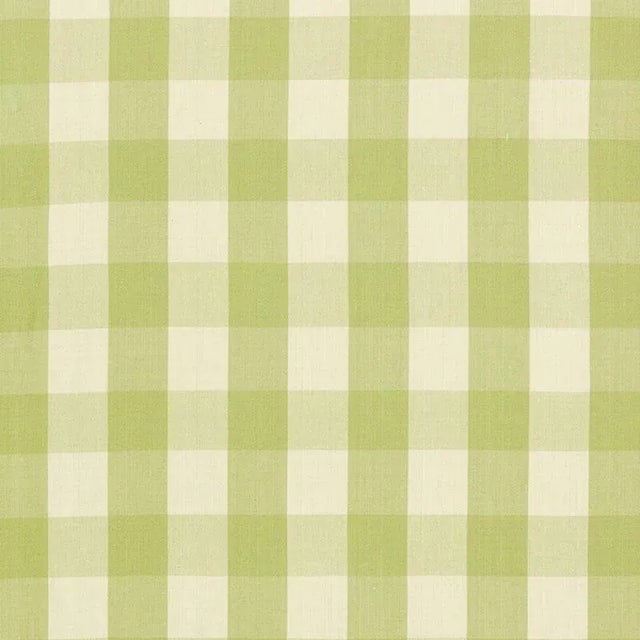 A classic one and a half-inch buffalo check, this woven cotton is a wonderful complement to both prints and plains. Sold...