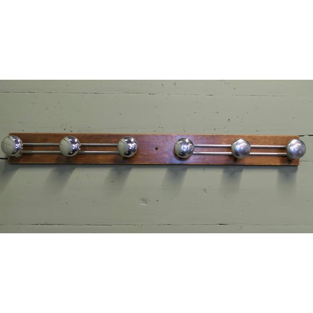 Very Stylish Chrome Cloakroom Hanging bracket The rack has 6 large round hooks, set on chrome and teak in good vintage...