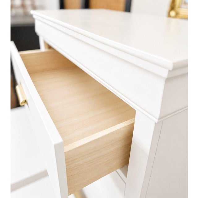 Refinished Five-Drawer Tall Chest in Warm White with Brass Hardware A classic five-drawer tall chest thoughtfully...