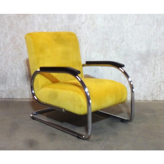 Solid and durable best describes the Tubax Armchair Model 1948R. This armchair is a cantilever because the chrome tubular...