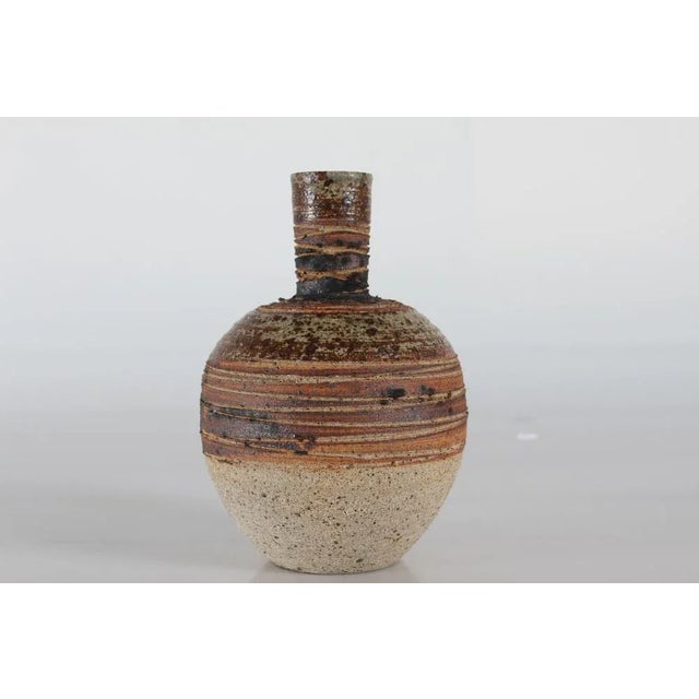 Ceramic vase by Danish ceramist Tue Poulsen (born 1939) from his own studio. Made ca 1970s. It is made with chamotte clay...
