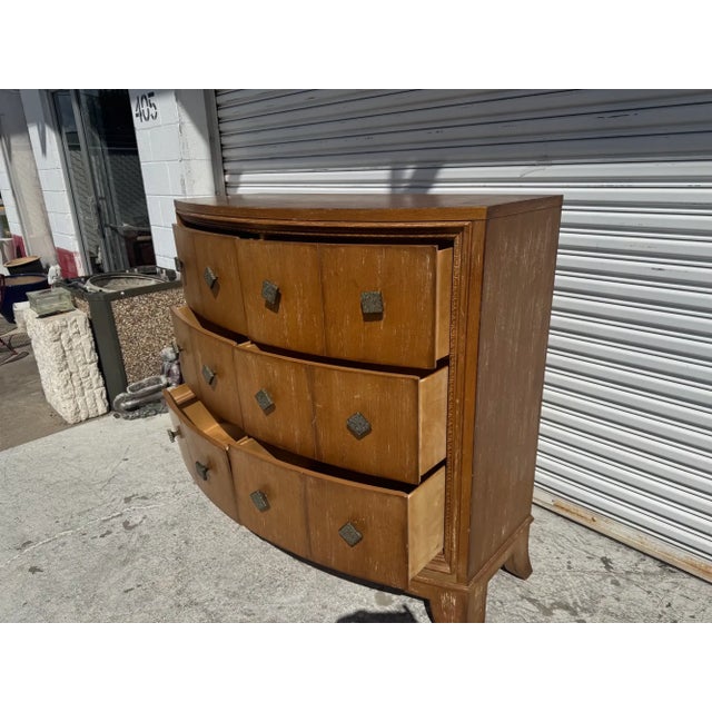 This 6 Drawer Dresser was made by Century Furniture Company. It's constructed of a Pecan wood and has an Edinburgh finish....
