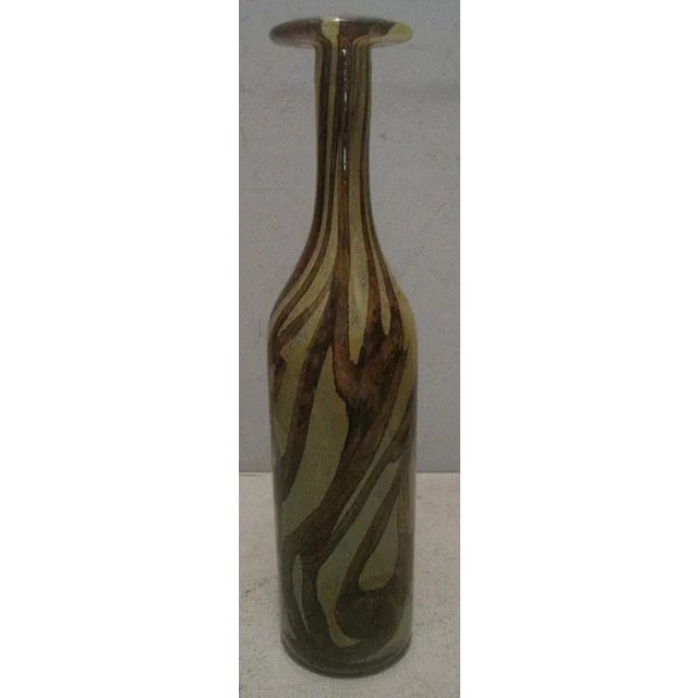 Lovely Mdina glass bottle vase, produced in Malta, off the coast of Italy. Beautiful tapered form, great iridescent colors.