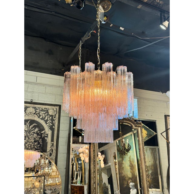 The Pink Murano Tronchi Glass Chandelier is a stunning fixture. With it's layers of glistening pale pink glass, this piece...