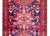 A beautiful early 20th century Persian Heriz runner with multiple stylized floral medallion running the length of the...