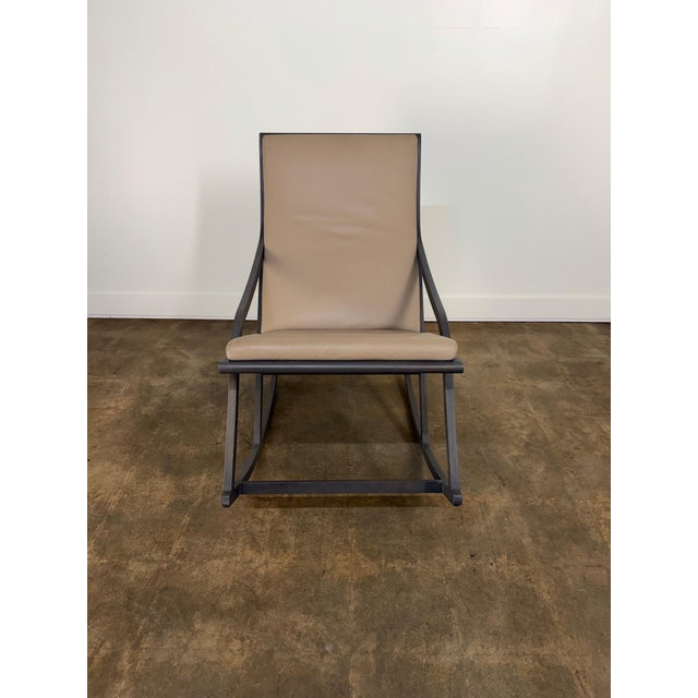 A refined and sculptural “Dérive 2” rocking lounge chair designed by Pierre Paulin and manufactured by Ligne Roset,...
