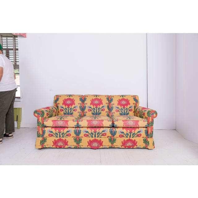 A vintage Madcap Cottage 3-cushion sofa custom-upholstered in a jaunty vintage yellow, red, green, and blue Turkish-...
