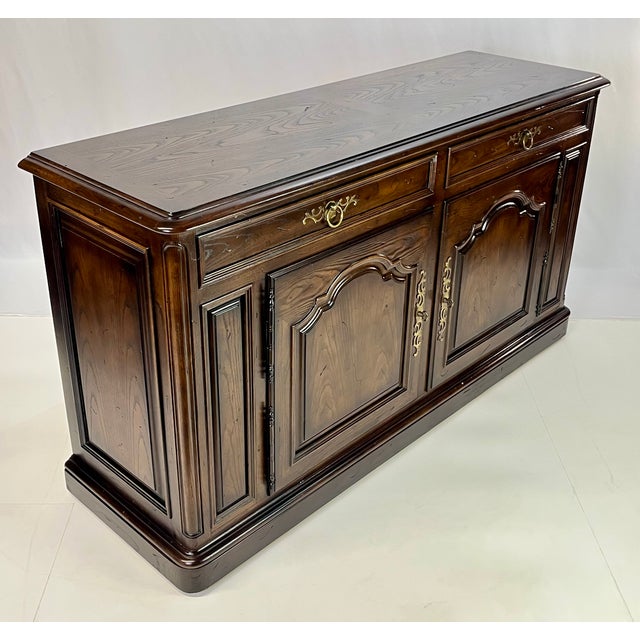 Very fine buffet from Henredon’s iconic "Four Centuries" collection. Crafted from rugged ash, this piece is a testament to...