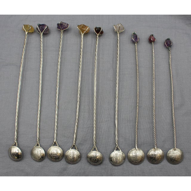 Collection of 9 Brazilian silver & quartz crystal iced tea spoons or muddlers. Sterling twisted wire shafts, each with a...