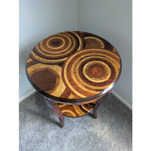 An exceptional signed Italian marquetry side table handcrafted in Sorrento, Italy by artisan Giuseppe Mastellone. This...