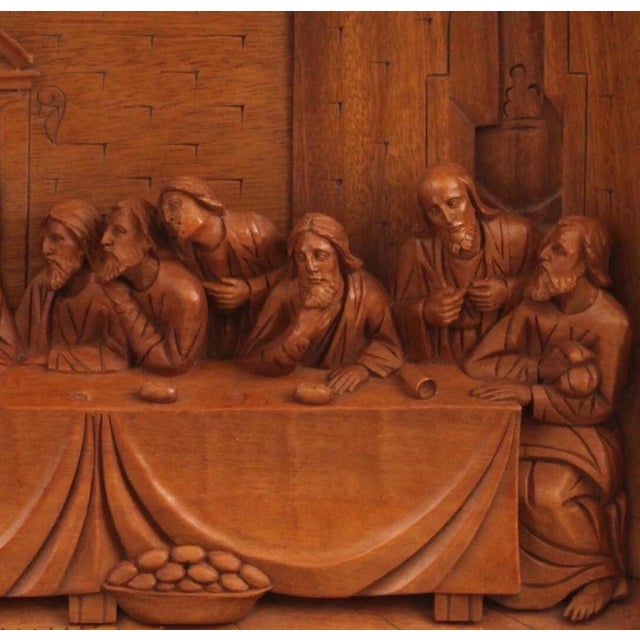 Carved in Italy, this large wood sculpture depicts Leonardo De Vinci's “The Last Supper.” Measuring 30 1/2" long by 19...