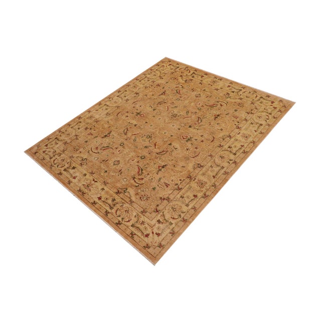 "Enhance the ambiance of your home with this magnificent Persian-influenced Turkish hand-knotted rug made by skilled...