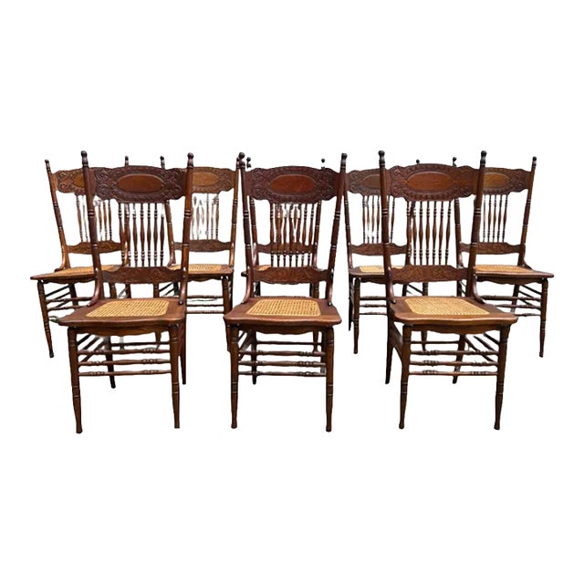 Early 20th Century Set of 8 Antique Oak Press Back Cane Seat Dining Chairs For Sale