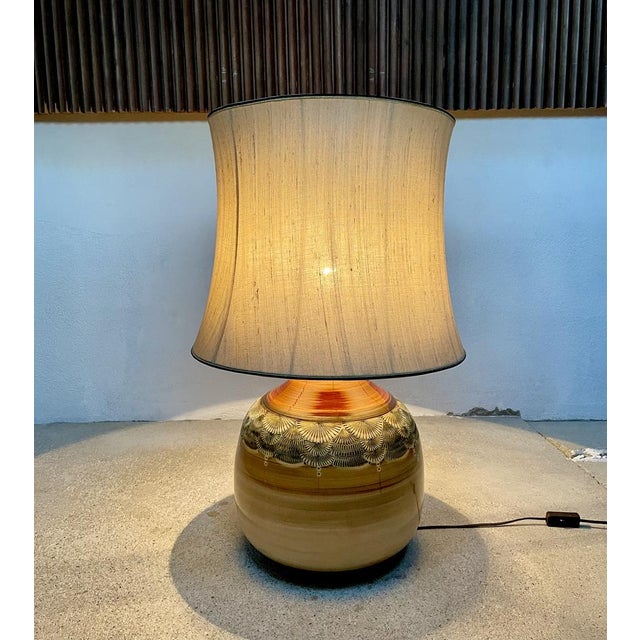 This large high-quality ceramic table lamp was hand-crafted at an unknown artist workshop in Germany during the early...