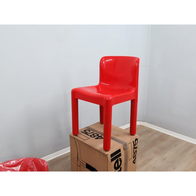 Technical Materials: This pristine pair of Model 4875 dining chairs, designed by the iconic Carlo Bartoli for the Italian...