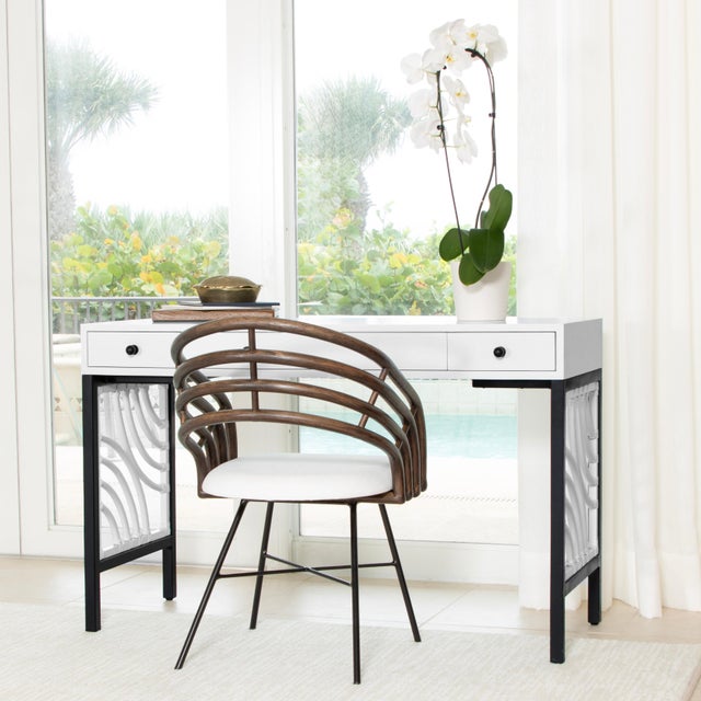 The Swirl Writing Desk is the perfect blend of style and functionality. Crafted with a maple wood desk top and metal legs...