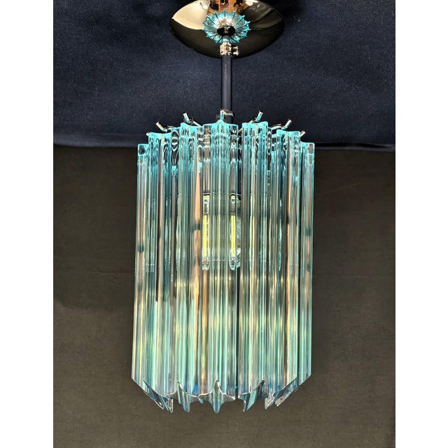 Timeless vintage murano ceiling lamp, venini-style, 1970s. Featuring 14 murano glass quadrihedral prisms in aquamarine...