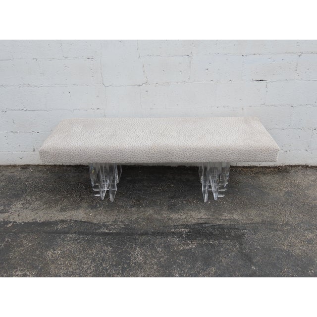 This beautiful Long Bench is made of Lucite, and upholstery. This piece was custom made, the legs are from a base of a...