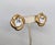 Circa 1989 goldtone round clear Swarovski rhinestone pierced push back earrings. Marked "NAPIER©" on the backs. Measure: 1...