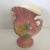 This pink vase with yellow magnolia flowers and green blue leaves is a Hull classic with soft lines and magnolia flowers...