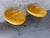A pair of Vintage Mid-Century Modern Hollywood Regency Wrought Iron Bench / Foot Stools. Circa 1960s Features an avocado-...