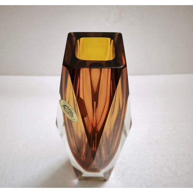 An exceptional Murano Formia Sommerso art glass vase, handcrafted in Murano, Italy during the mid-century modern period....