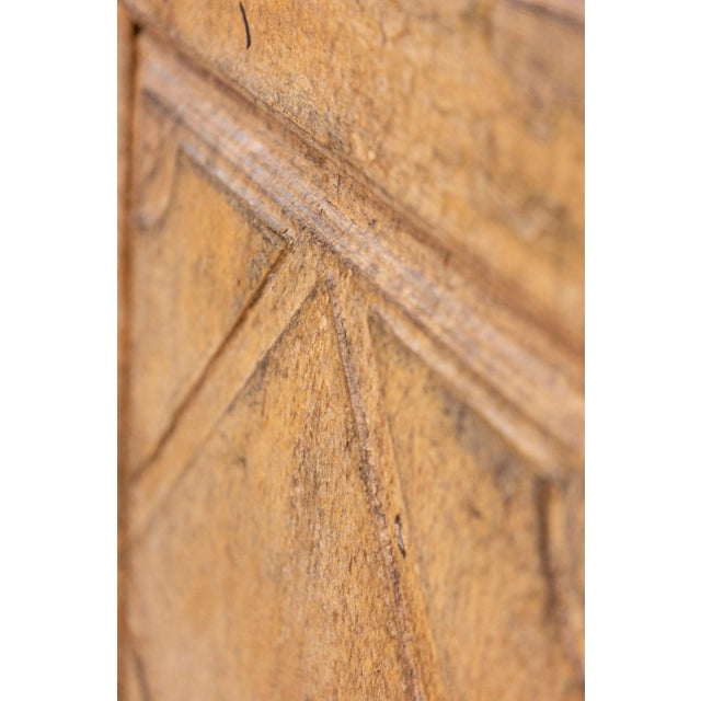 An Italian painted buffet from the 17th century with diamond motifs and distressed patina. Born in Italy during the 17th...