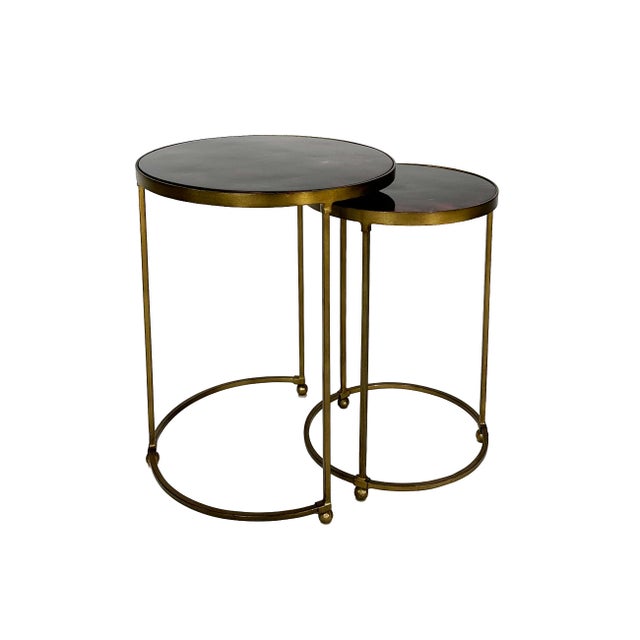 Lovely set of round nesting accent tables with patinated brass frame and pen shell/faux tortoise shell tabletops by Crate...